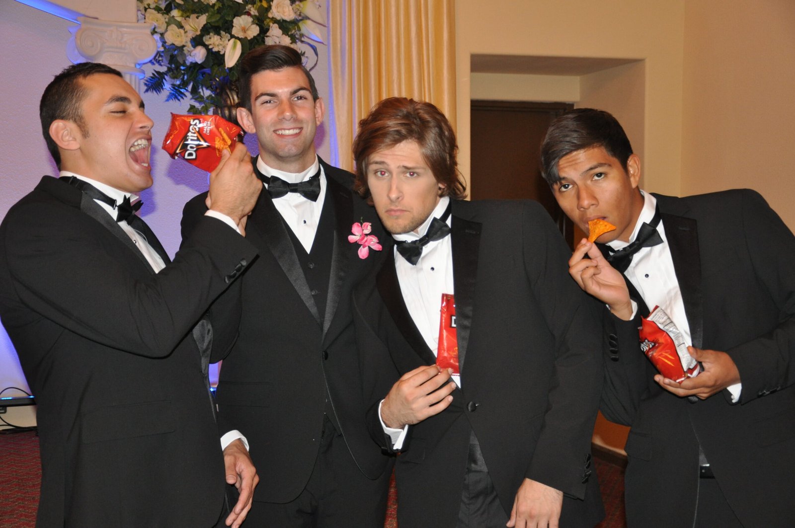 Actors in formal clothing during a Doritos commercial production
